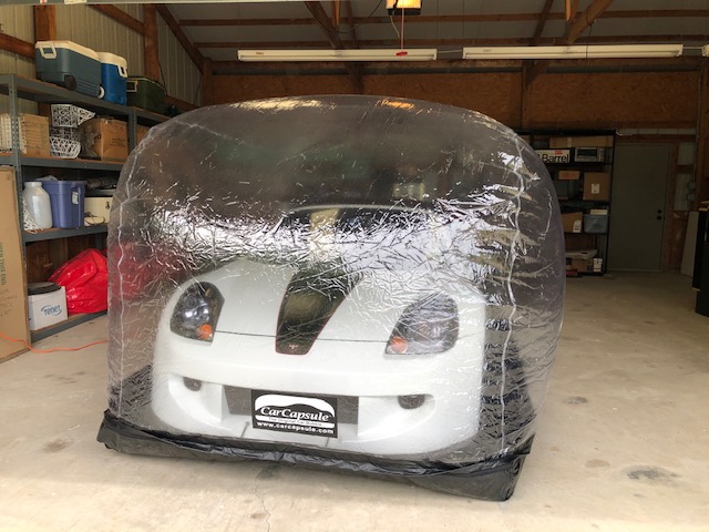 An image of an car in an inflateable car bubble